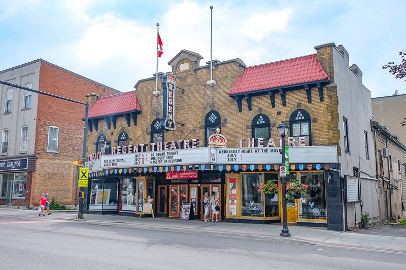 historic theatre building with main street in front in picton ontario