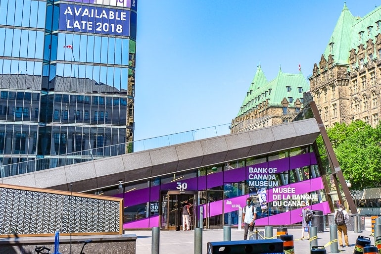 purple entrance with angled concrete and glass in downtown ottawa.