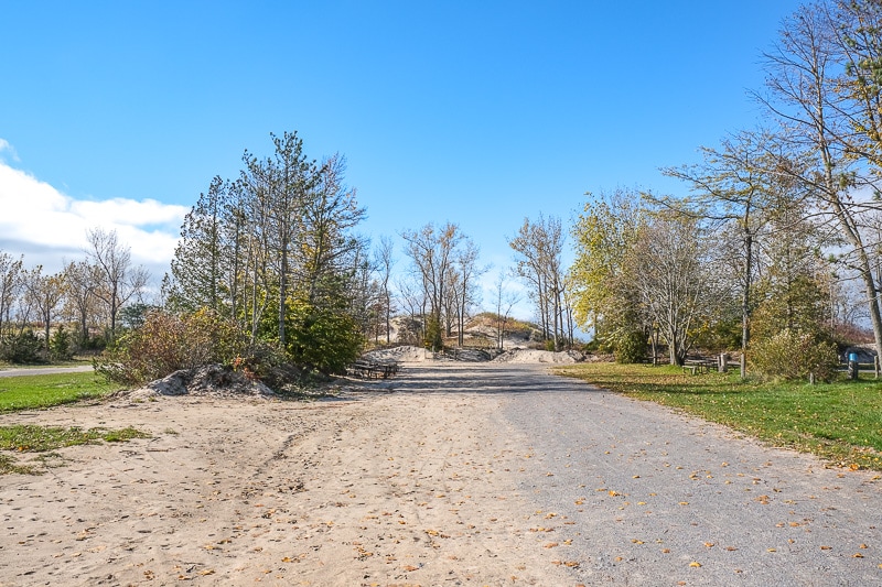 gravel road through parking area at sandbanks provincial park